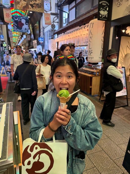 Jenny with matcha soft serve at Nishiki Market, Kyoto