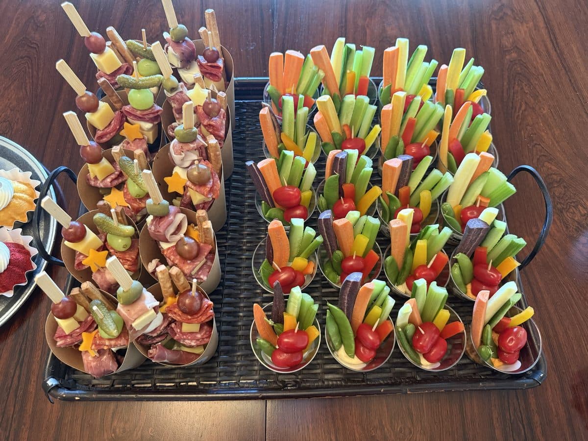 Trays of individual crudité and antipasto cups for an event